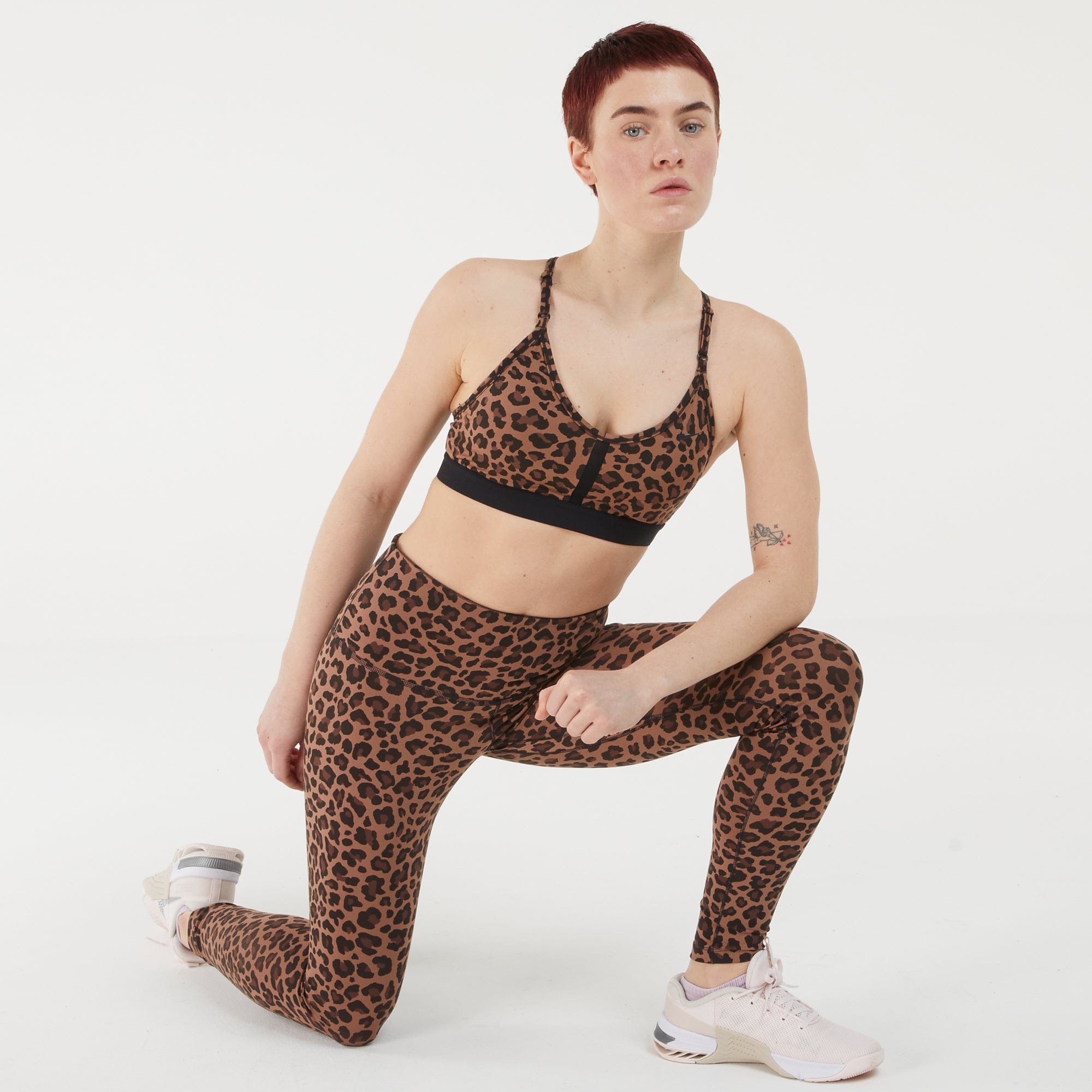 Buy Nike Brown Dri-FIT Indy Light-Support V-Neck Leopard Print Bra from  Next Luxembourg